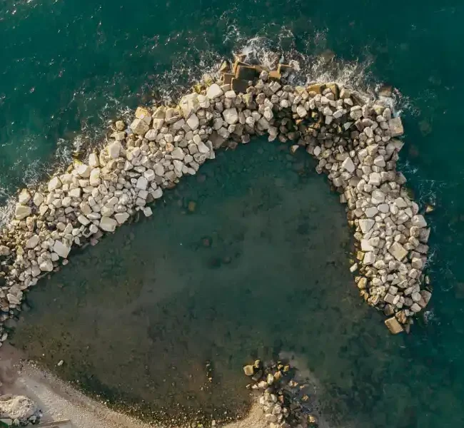 opera con massi ciclopici Impresa Messina Isola d'Elba